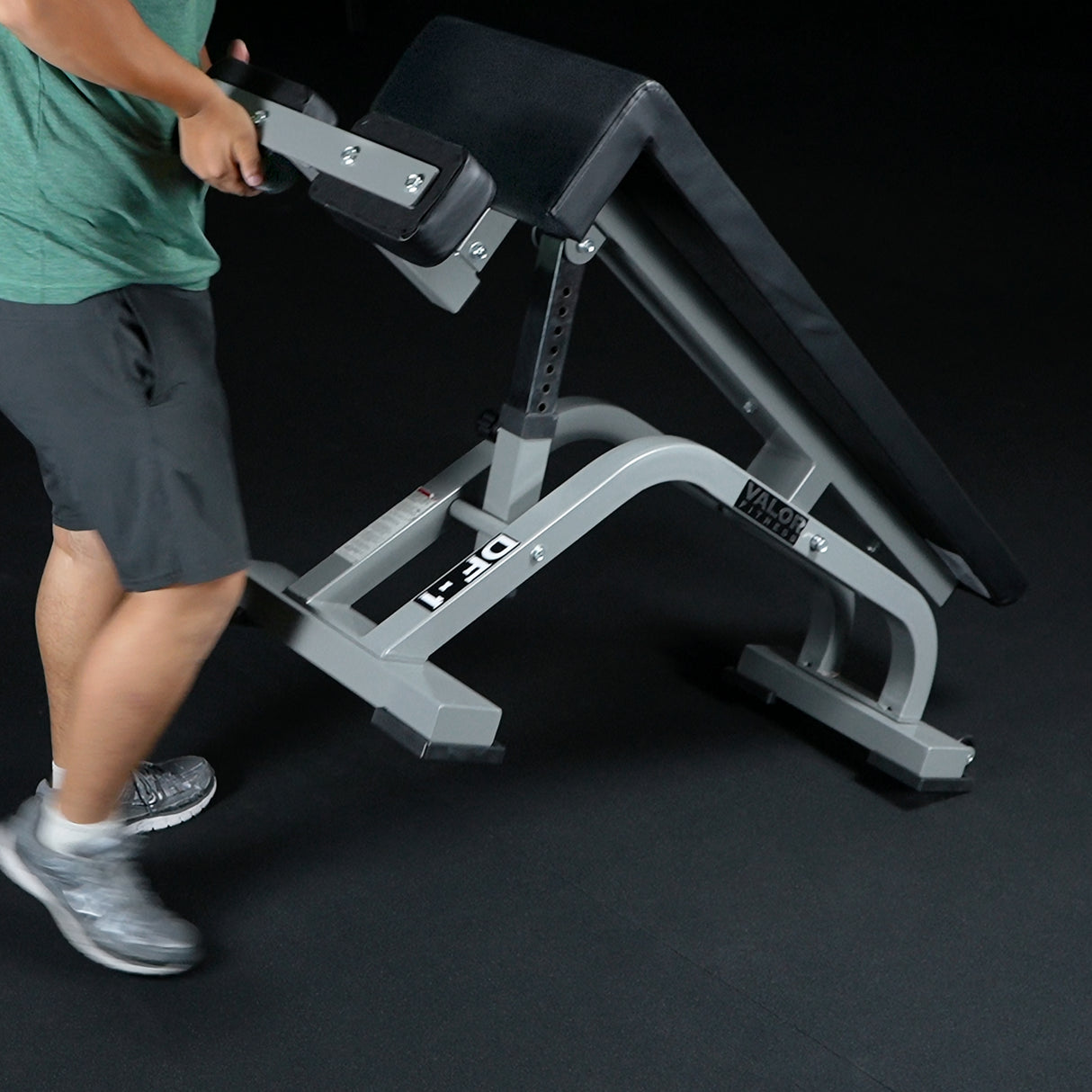 Moving a decline exercise bench with wheels
