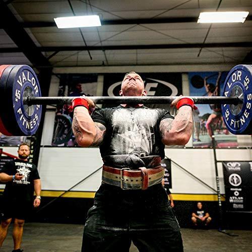Strongman using axle barbell