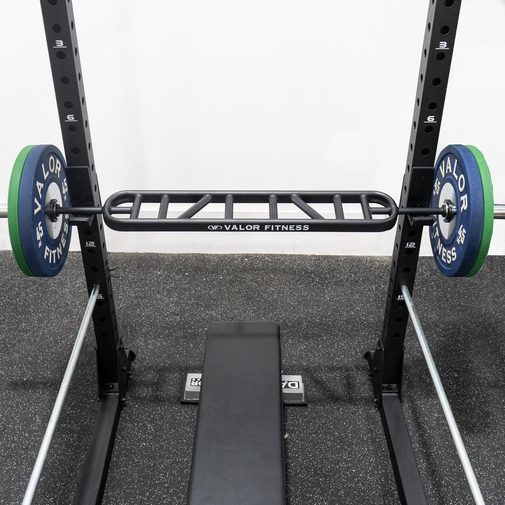 Multi-Grip Swiss Football Barbell racked on Bench Press Station