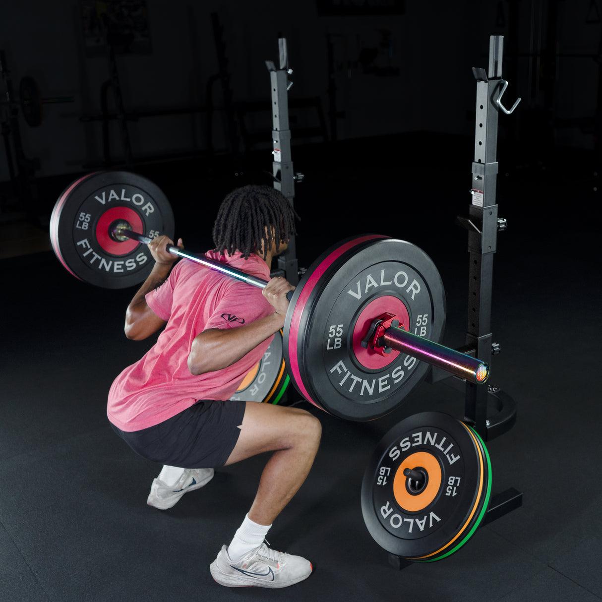 and Valor Fitness weights in a gym setting