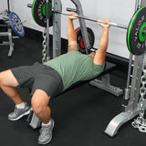 Bench press exercise with a Valor Fitness Smith Machine